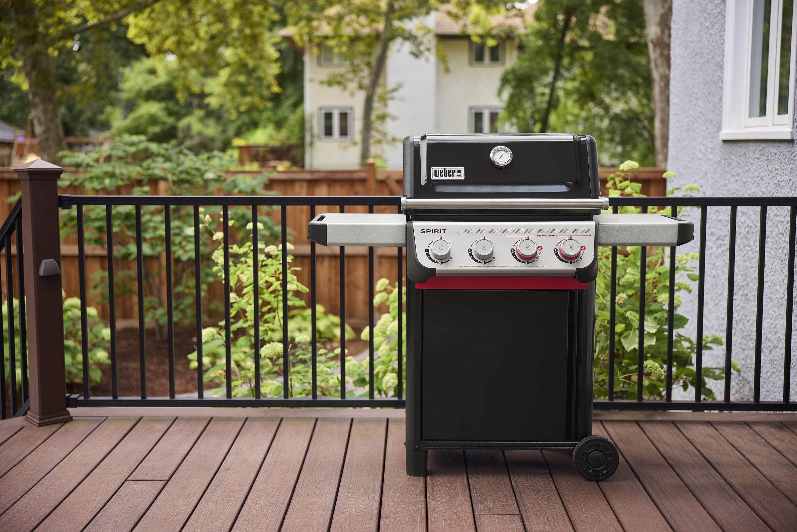 Weber Spirit Gas Grill, E-425 4 Burner Propane Gas Grill with Wheels, Black